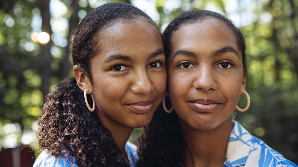 Identical twins at the Twins Days Festival in Twinsburg, Ohio. Identical twins form when one egg, fertilised by one sperm, splits  (Credit: Josie Gealer/Getty Images)