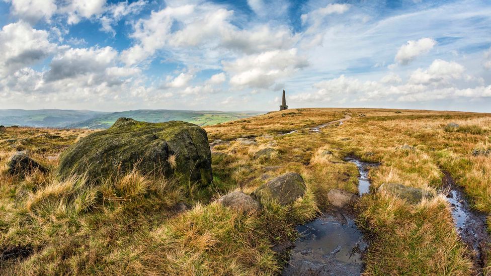 The 121ft Stoodley Pike monument dominates the skyline of the Upper Calder Valley (Credit: petejeff/Getty Images)