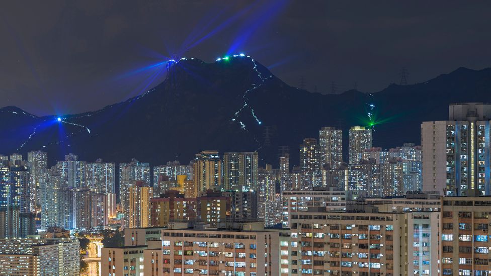 In 2019, pro-democracy activists lit up Lion Rock using torches, lanterns and laser pens (Credit: Joe Chen Photography/Getty Images)