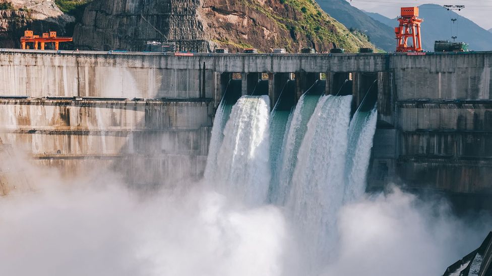 Gravity batteries work in a similar way to pumped hydro, which involves funnelling water uphill before releasing it through turbines to generate energy (Credit: Getty Images)