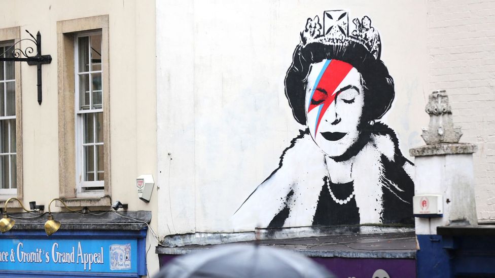 The Banksy mural in Bristol of Her Majesty made up as Bowie's iconic Aladin Sane is an affectionate homage (Credit: Alamy)