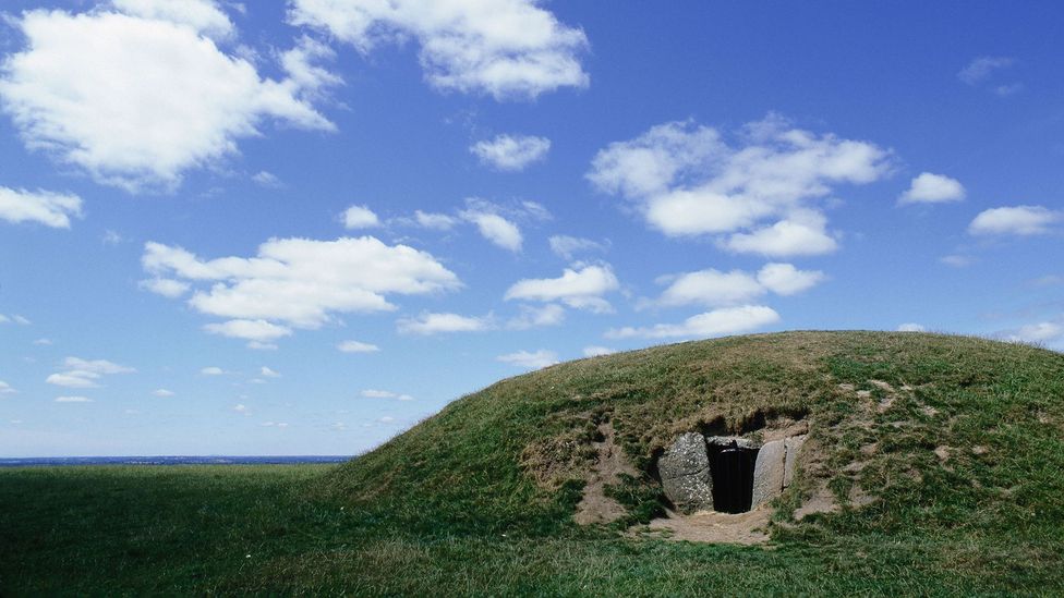 As human civilisation continued, ornate tombs – like this Irish burial mound – became more common (Credit: Werner Forman/Universal Images Group/Getty Images)
