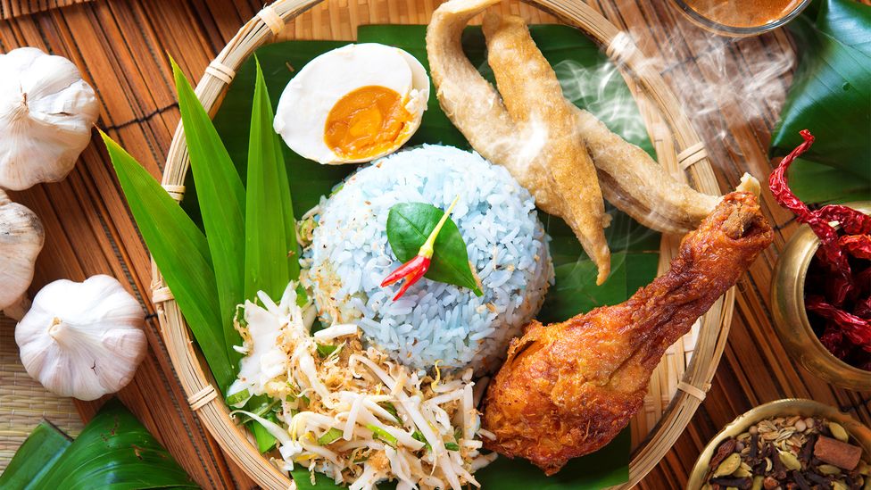 Peranakan food (pictured: Nasi kerabu) is often considered one of Southeast Asia's first fusion cuisines (Credit: szefei/Getty Images)