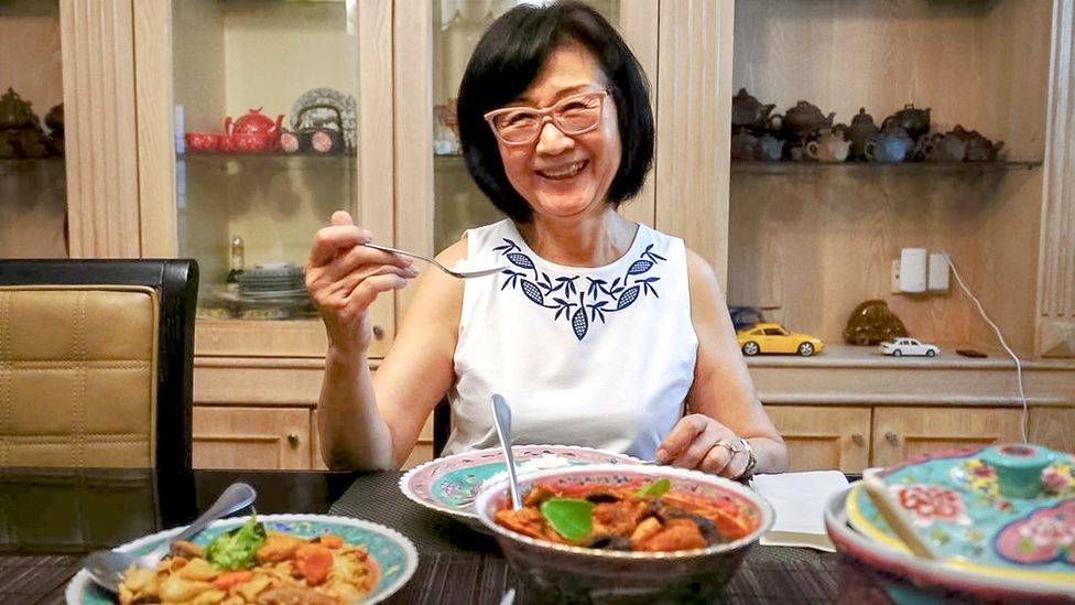 Elizabeth Ng learned to cook Peranakan food from her grandmother and now teaches classes in her Singapore home (Credit: Rachel Phua)