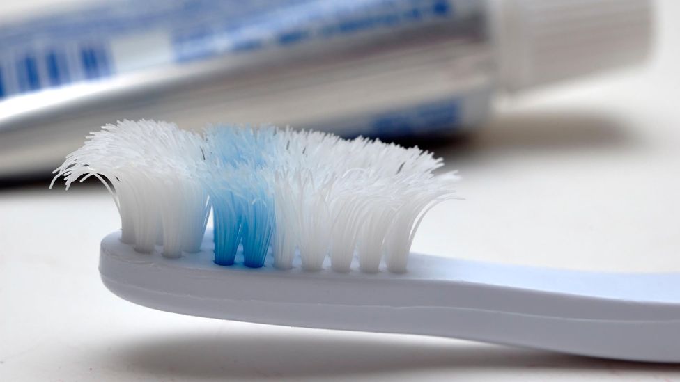 An old, over-worn toothbrush doesn't clean the teeth as effectively (Credit: Alamy)