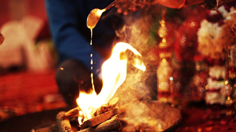 Traditionally, Hindus pour ghee into fire at marriages, funerals and other ceremonies  (Credit: rvimages/Getty Images)
