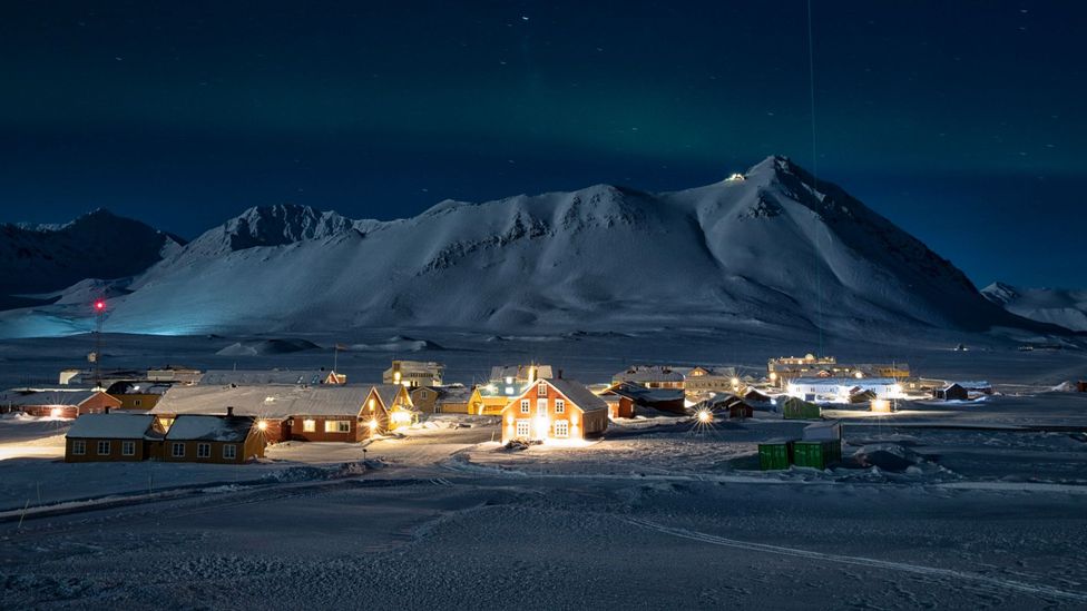 Ny Ålesund sits in the shadow of Zeppelinfjellet, where an atmospheric observatory monitors the air for signs of pollutants (Credit: Anna Filipova)