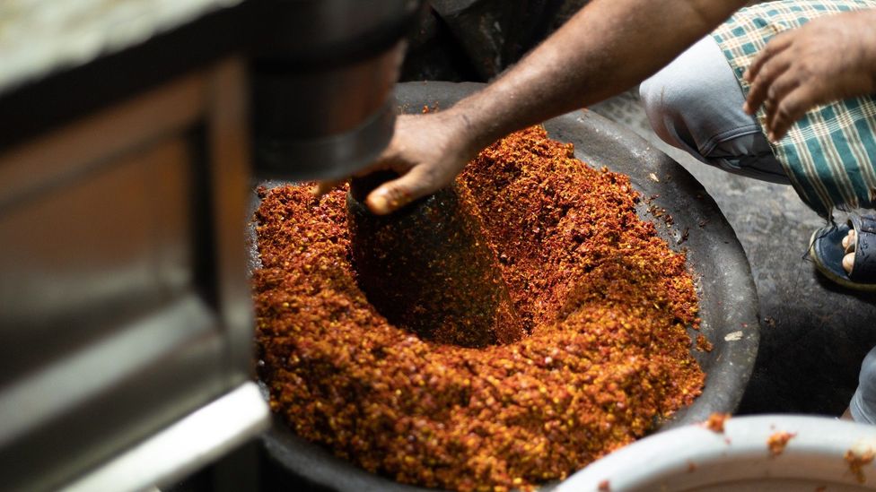 Dried red chillies, chilli flakes, rock salt, fennel seeds and other spices are ground coarsely (Credit: Hari Prasad)