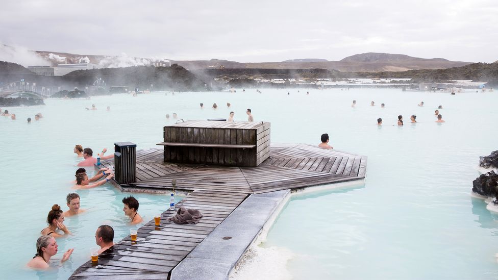 The Blue Lagoon in Iceland is one of the most famous natural pools in the world (Credit: Getty Images)