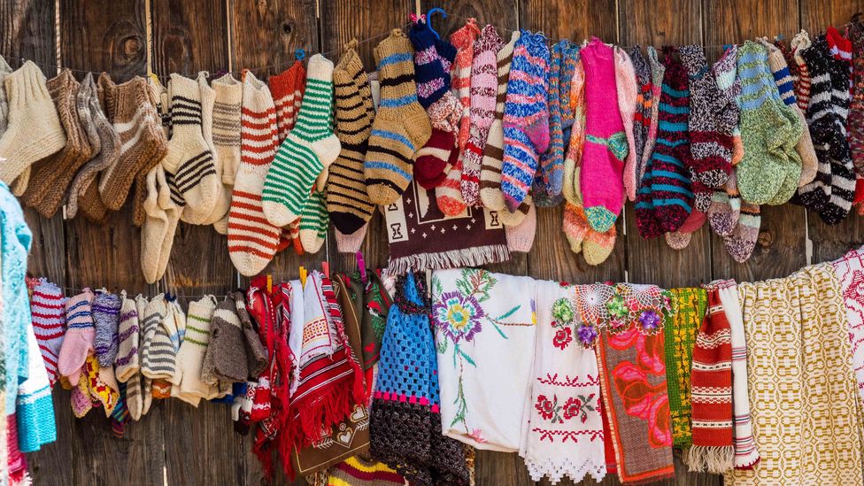Local women earn an income making socks, slippers and other handicrafts (Credit: Hemis/Alamy)