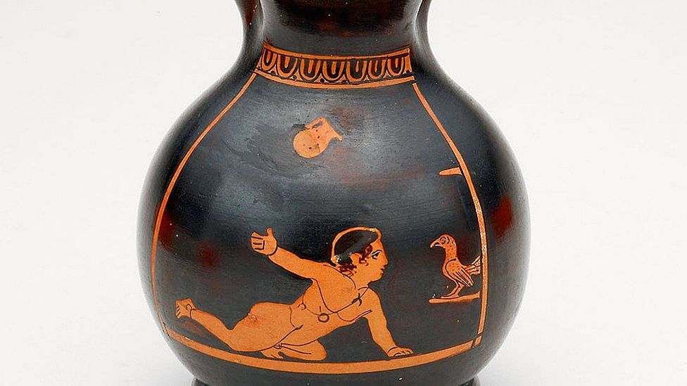 Small Ancient Greek jugs like this one from 430 BC, which are called choes, often show children playing (Credit: Alamy)