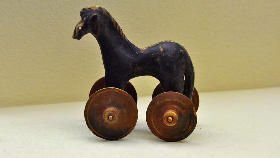 Was this miniature horse on wheels, found in a 2,100-year-old grave, a toy, a funerary offering to the gods, or both? (Credit: Kerameikos Archaeological Museum in Athens)