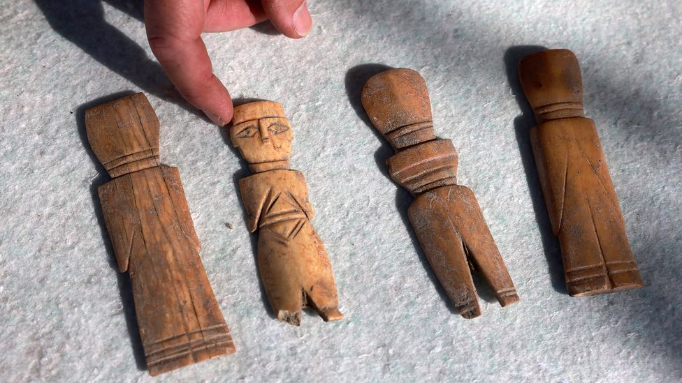 Various female figurines have been found all over the world, including these, dating back 1,500 years, in Israel – but were they meant for children? (Credit: Getty Images)