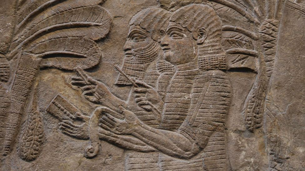 A relief of scribes taking notes in ancient Nineveh (Credit: Alamy)