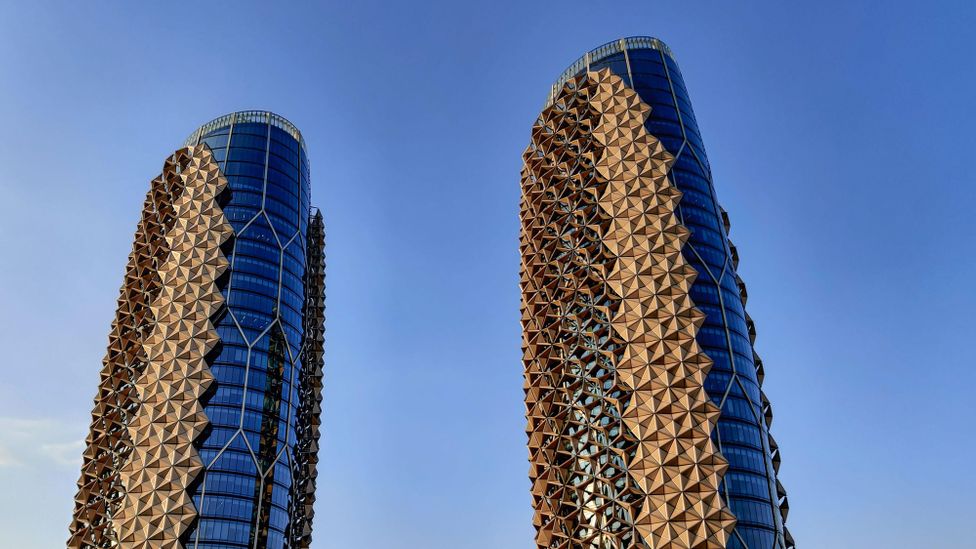 The Al-Bahr towers in Abu Dhabi have a kinetic jaali facade, which is inspired by the texture of human skin (Credit: Alamy)