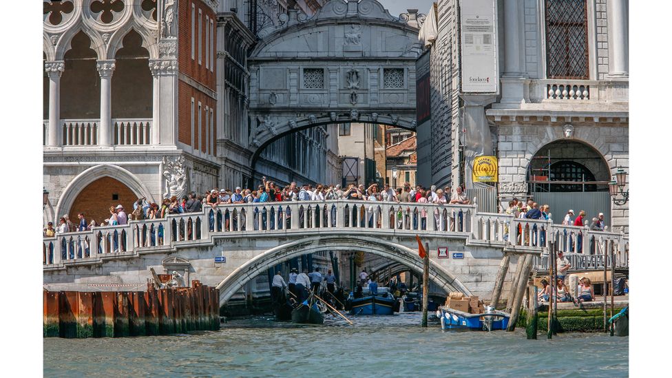 During peak days in the summer in Venice, tourists can outnumber locals by a ratio of 2:1 (Credit: Andia/Getty Images)