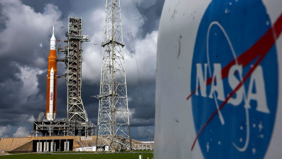 Artemis on launch platform and Nasa logo (Credit: Kevin Dietsch/Getty Images)