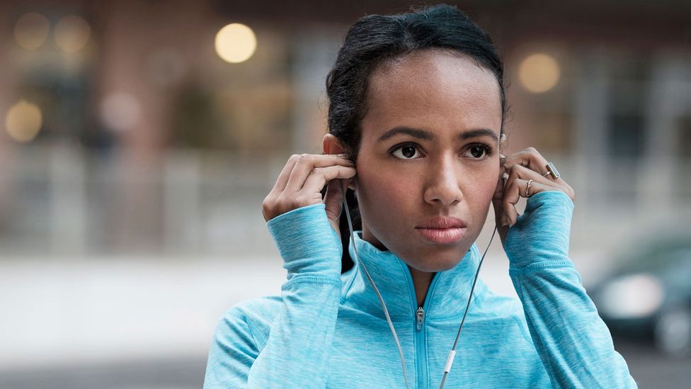 Some workers find themselves listening to podcasts or reading books that are relevant on to their jobs – on their own time (Credit: Getty Images)