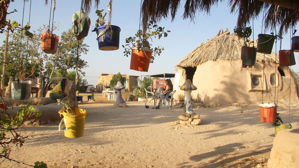 Visitors to Lotan stay in eco-friendly mud domes and help build structures from mud (Credit: Israel Images/Alamy)