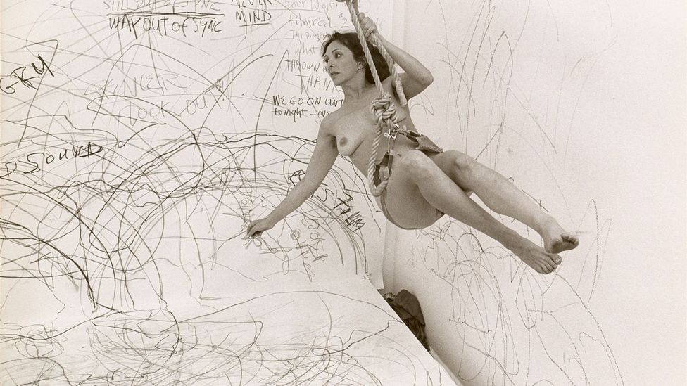 In Up to and Including Her Limits, Schneemann swung between walls of paper making marks with crayons (Credit: Carolee Schneemann Foundation / ARS, New York/ DACS, London)
