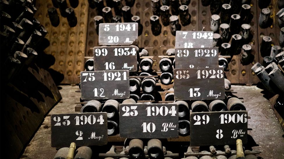 In Reims, old Champagne bottles are stacked in an underworld of more than 200km of cellars (Credit: Lily Radziemski)