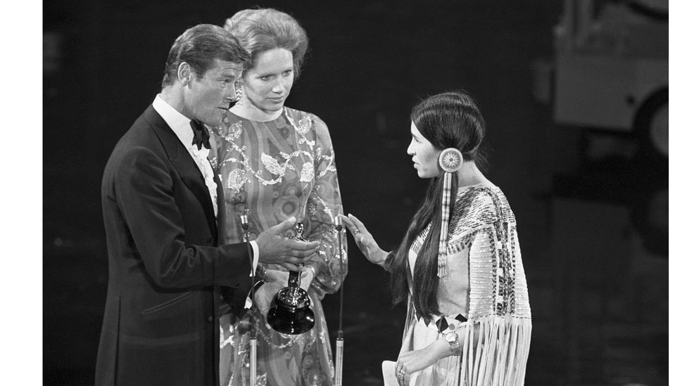 Sacheen Littlefeather declined the attempt by the surprised presenters Roger and Liv Ullmann to hand her the Oscar (Credit: Getty Images)