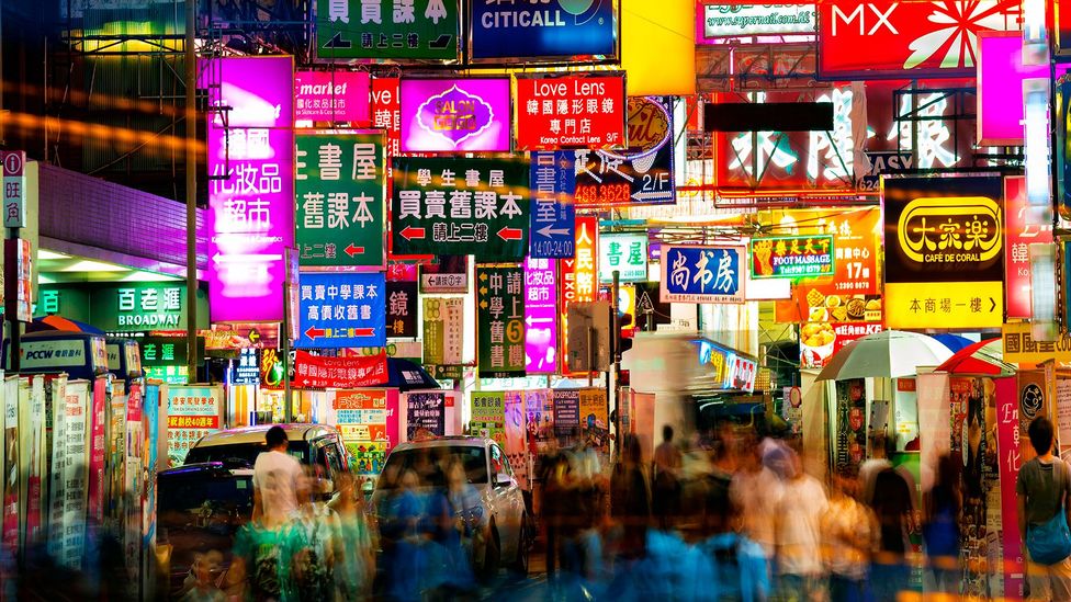 Neon signs in Hong Kong with Chinese and English writing (Credit: Getty Images)