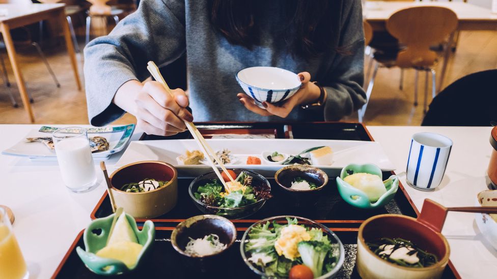 Dining alone is a cultural norm in Japan with many eateries offering seating for solo diners (Credit: D3sign/Getty Images)