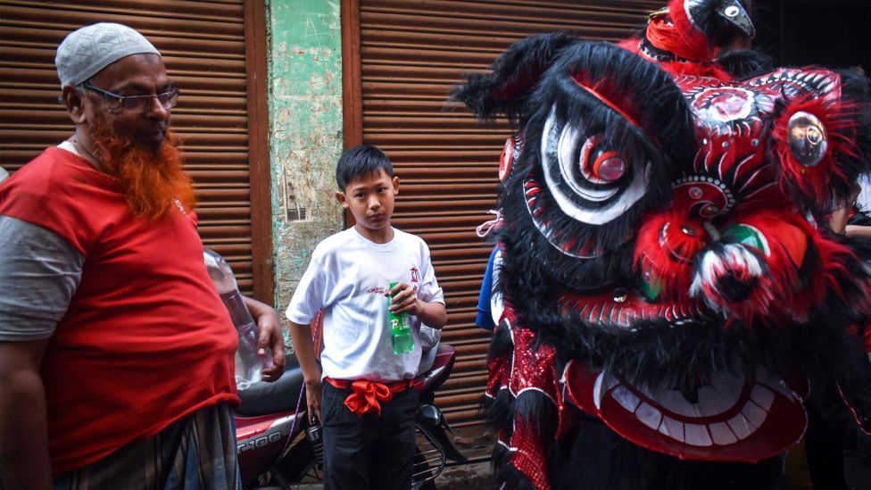 Chinese culture can still be seen in the annual lion dances to welcome the Lunar New Year (Credit: Sudipta Das/Alamy)