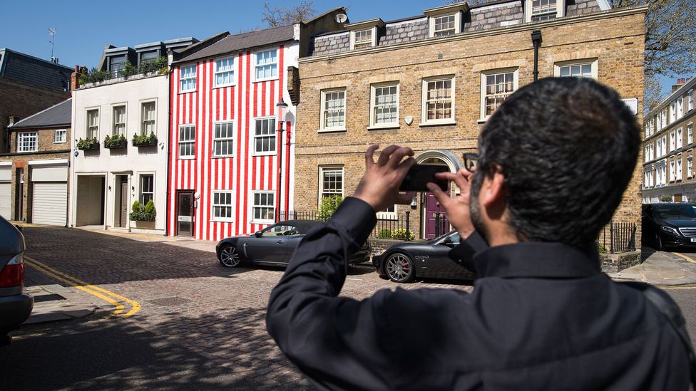 A homeowner in Kensington, London, chose candy stripes for her house front – it proved to be a divisive look (Credit: Getty Images)