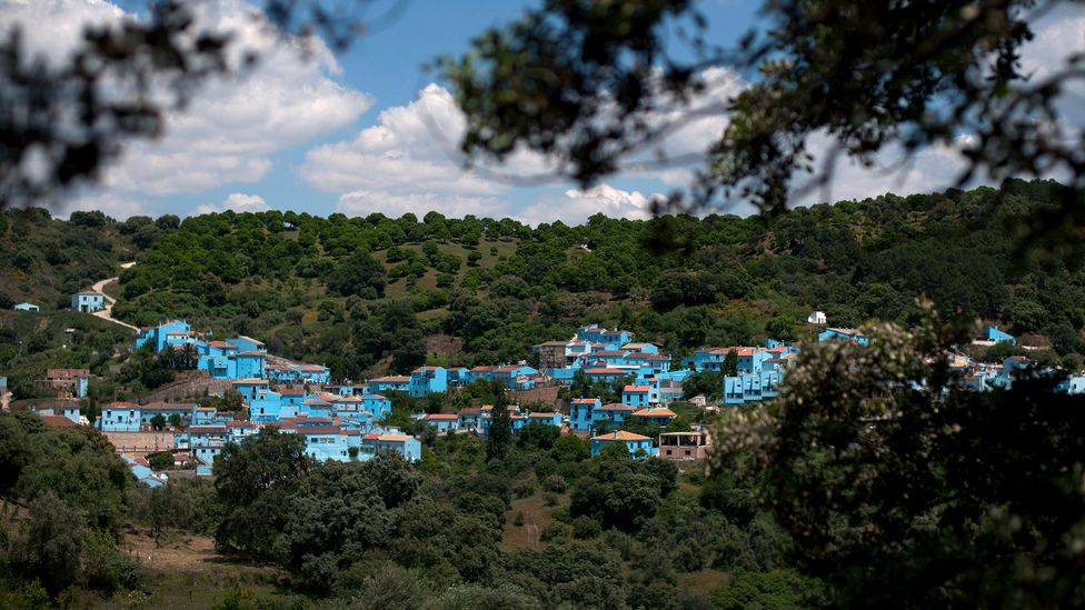 Controversially, the village of Júzcar in Spain was painted blue to promote a Smurfs movie (Credit: Getty Images)