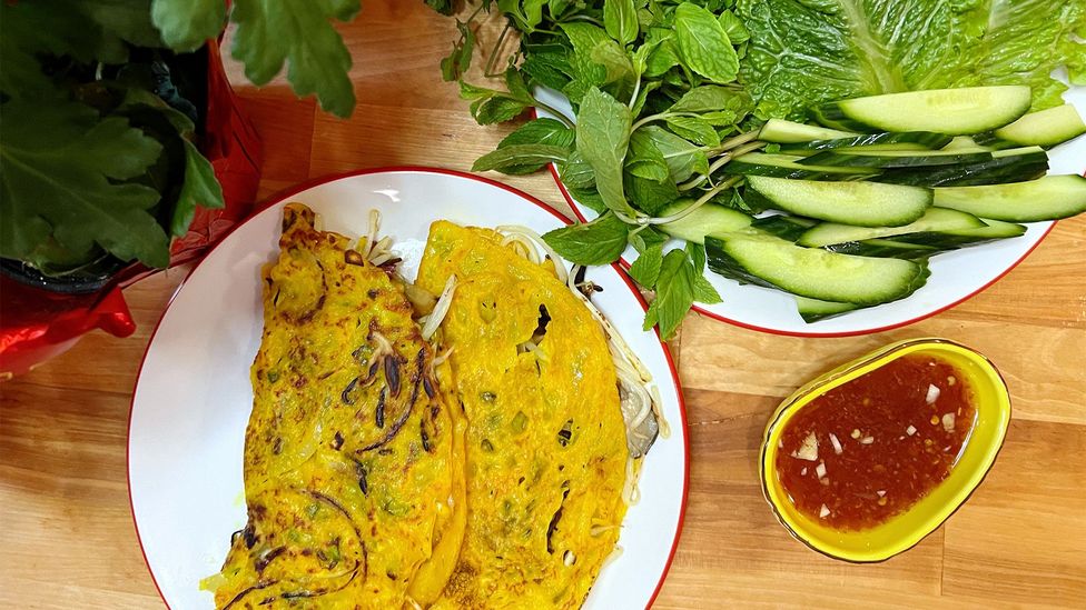 Bánh Xèo are sizzling golden crepes made with mung beans, mushrooms and crispy jicama (Credit: Thuy Pham)
