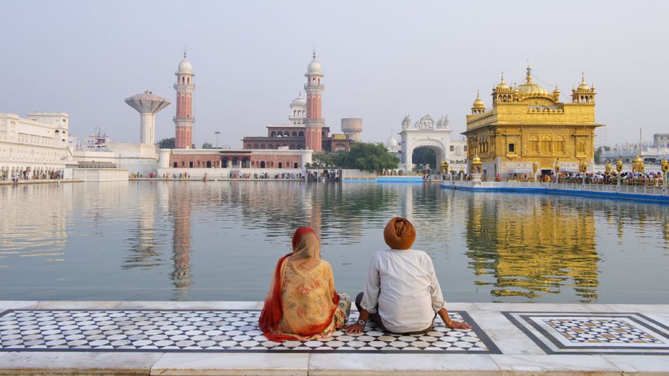 The Sikh religion places a strong emphasis on doing good deeds and helping others (Credit: Alison Wright/Getty Images)