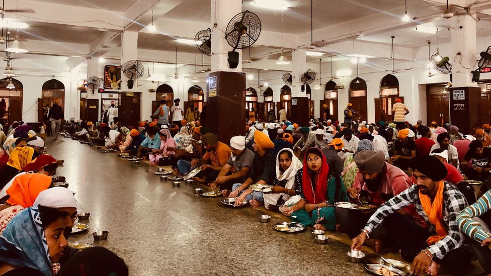 The Golden Temple's communal kitchen serves hot meals to 100,000 people each day (Credit: Raphael Reichel)