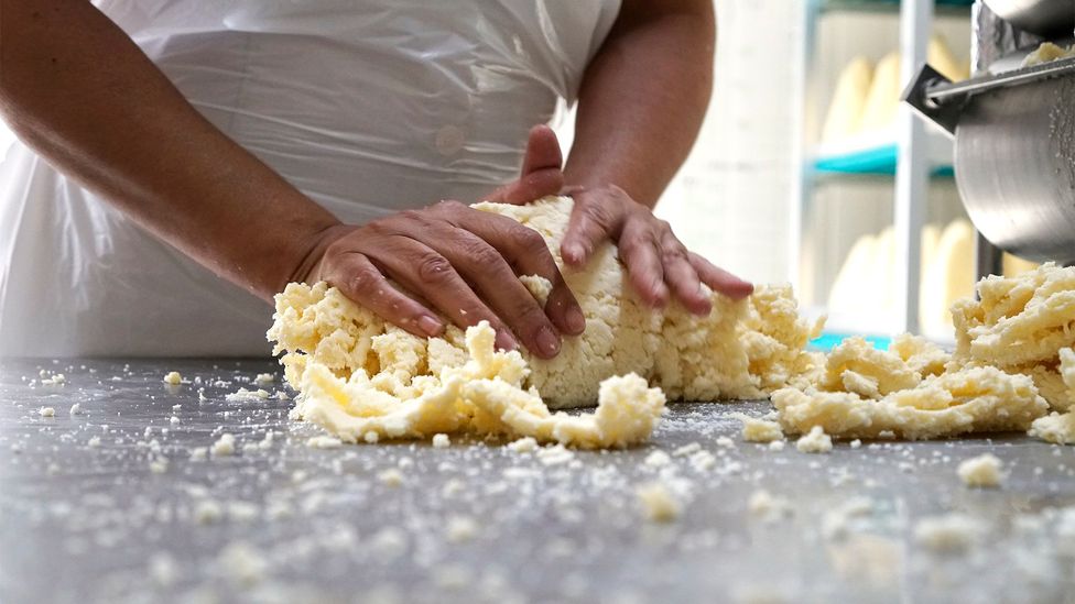 The curd is kneaded with salt between pressings in the rabilar (Credit: Linni Kral)