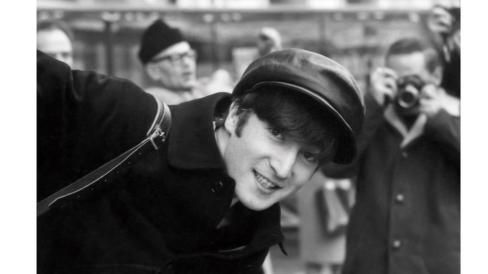John Lennon pictured in Paris – the images are featured in a new book, Eyes of the Storm (Credit: Paul McCartney)