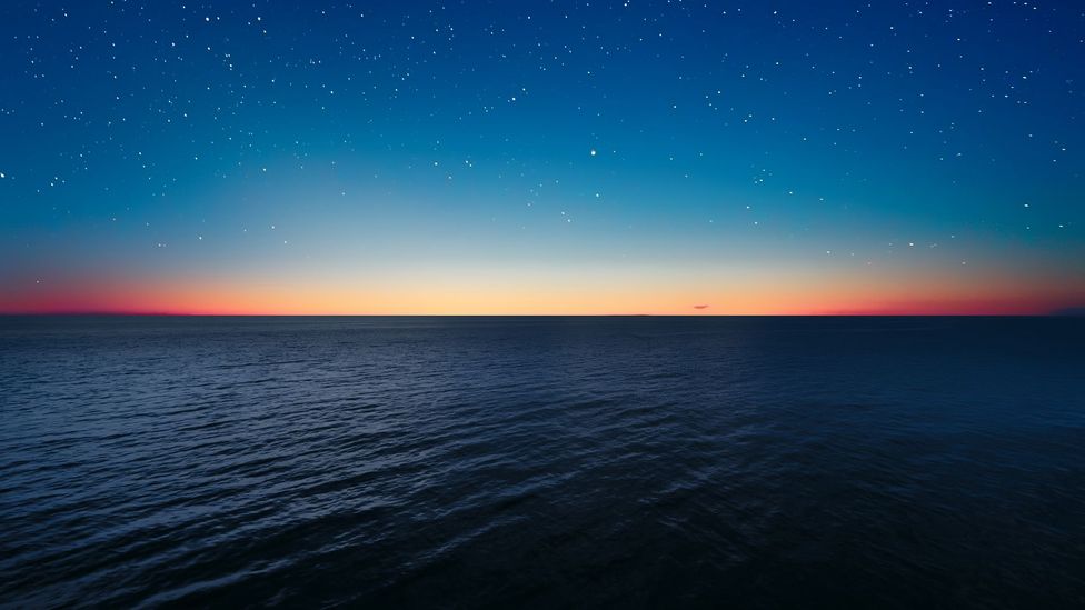 The open ocean under a starry sky (Credit: Getty Images)