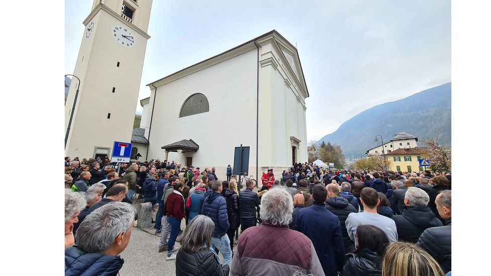 Locals in Trentino, Italy, gather for a funeral service for Andrea Papi, a young man killed by a brown bear this year (Credit: Autonomous Province of Trento)