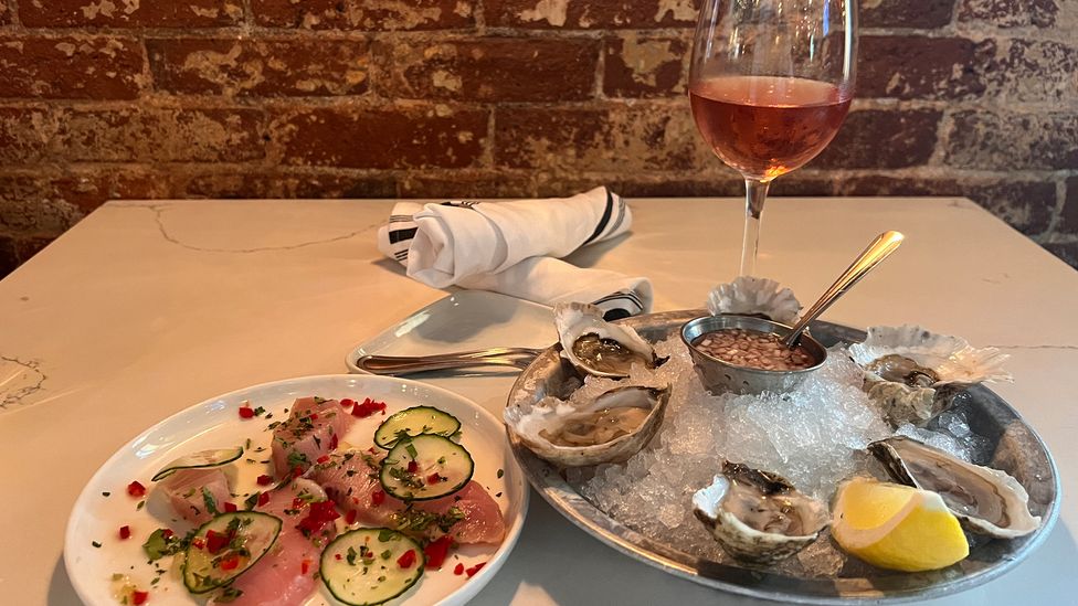 Dovetail's oyster bar is located in a historic naval building (Credit: Kim Foley MacKinnon)