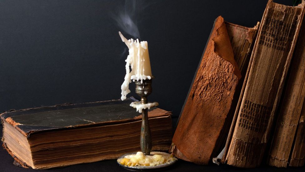 Picture of some old books and a gothic candle