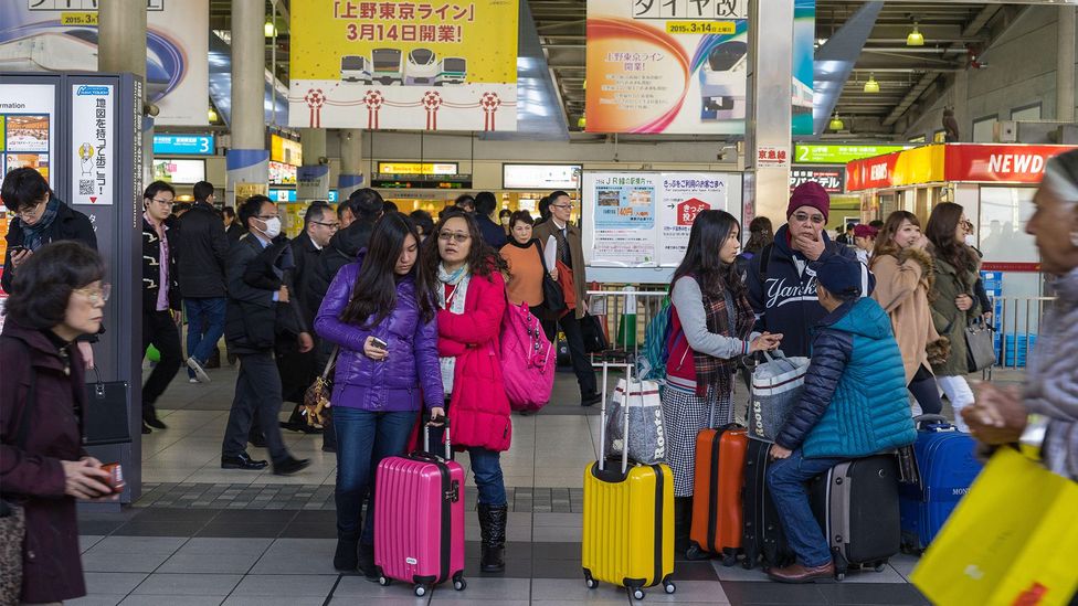 The "Any Wear, Anywhere?" stunt has been fashioned so passengers heading to Japan can check-in or carry-on minimal luggage (Credit: Dinodia Photos/Alamy)