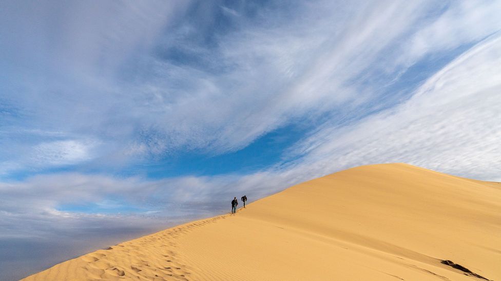 When the wind is right, Kazakhstan's "Singing Dunes" produce a low-pitched sound similar to nomadic throat-singing (Credit: Yulia Denisyuk)