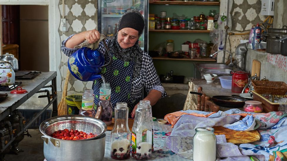 Hamidova welcomes visitors with fresh compote, a drink made from blackberries, geranium leaf and sugar (Credit: Simon Urwin)