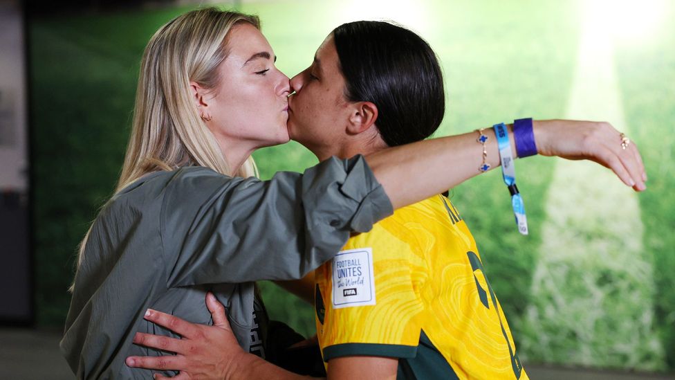 Sam Kerr of Australia celebrates with her partner Kristie Mewis