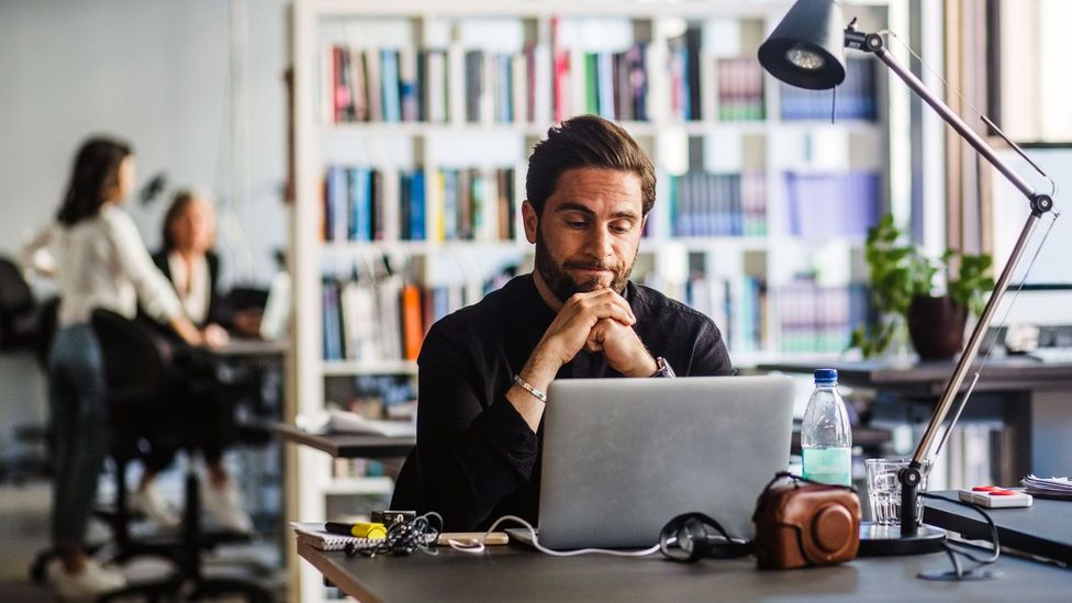 Many workers don't want to show up to their desks five days a week, but some are left with no choice (Credit: Getty Images)