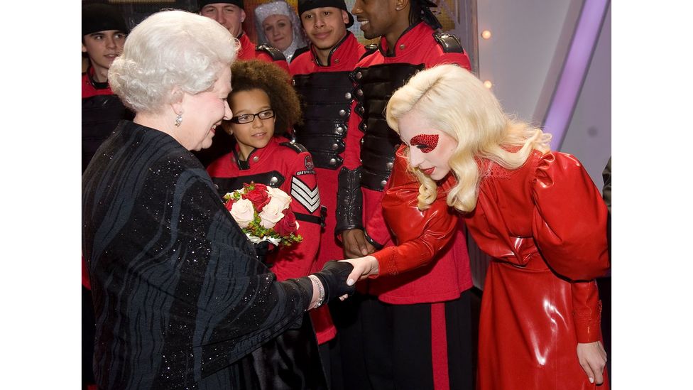 When meeting Queen Elizabeth II at the annual Royal Variety Performance in 2009, Lady Gaga donned a floor-length red latex Atsuko Kudo dress (Credit: Getty Images)
