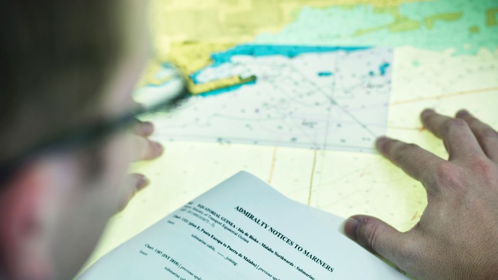Updates to the nautical charts produced by the UKHO are sent out every week to vessels, who mark changes with a pen on their own paper copies (Credit: UK Hydrographic Office)