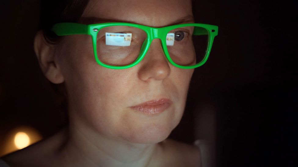 Woman with green glasses