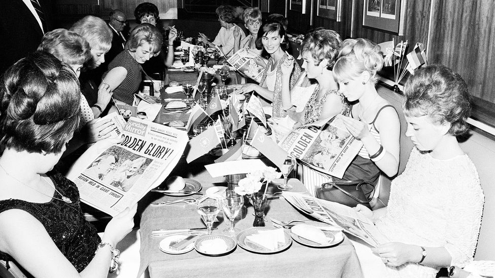 While footballers' wives (pictured at a 1966 banquet) had always been of interest, they became tabloid fodder in the early 2000s (Credit: Getty Images)