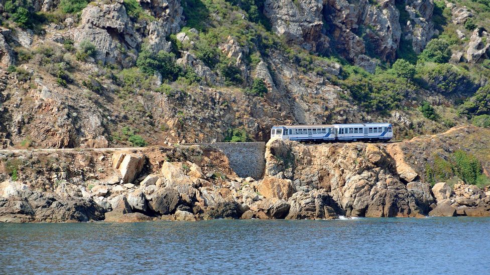 Corsica's "Little Train" connects three coastal cities and a string of remote interior communities (Credit: P Eoche/Getty Images)